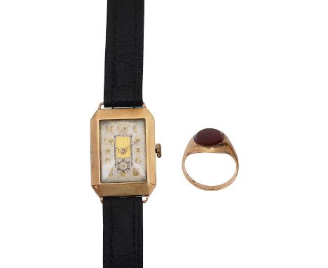 A 9ct gold gentleman's signet ring with a 9ct gold watch headthe signet ring set with carnelian, together with a manual wind 