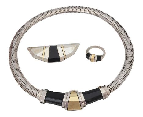 A 1980s Cartier 18K gold, silver and onyx brooch, necklace and ring suitethe necklace with articulated snake link chain with 
