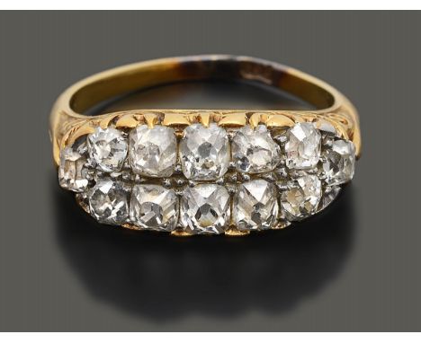 An early/mid 19th century diamond-set ringset with 12 mostly cushion-shaped old brilliant-cut diamonds to the pierced and scr