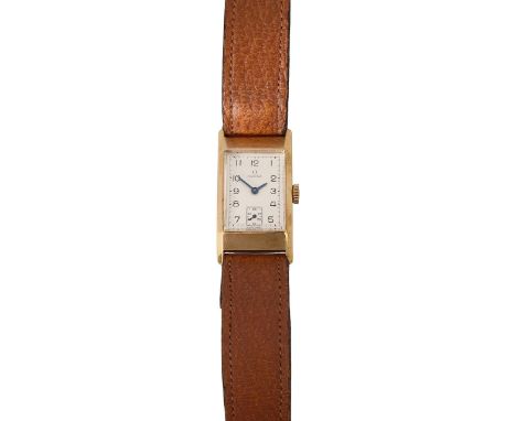A 1950s 9ct gold Omega manual wind wristwatchthe rectangular gold case with silvered dial, Arabic numerals and subsidiary sec