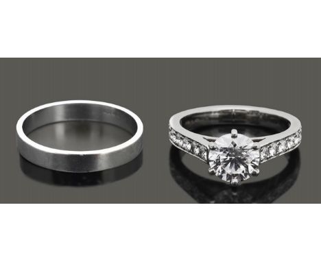 A diamond single stone ring the brilliant-cut diamond estimated to weigh 1.25cts coronet-set above the seven brilliant-cut di