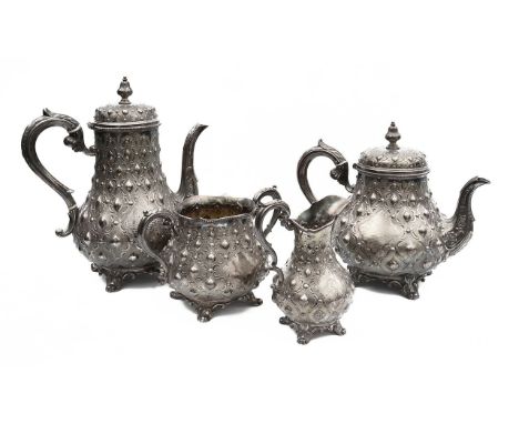 A mid Victorian silver four piece tea serviceSheffield, 1866, Martin, Hall & Coof bellied form, decorated with c-scrolls and 