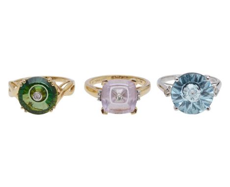 Three 9ct diamond and gem set 'Glenn Lehrer' ringsfeaturing an cushion cut amethyst, corner set in 9ct hallmark gold with cen