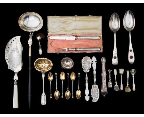 A collection of 19th century German silver mostly unmarked comprising a mother of pearl handled fish slice, the blade engrave