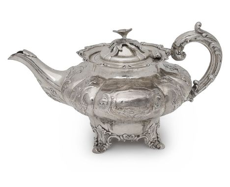 An early Victorian silver teapotLondon, 1841, William Brown & William Nathaniel Somersallof lobed squat melon form embossed w
