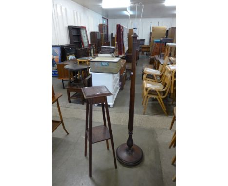 An oak standard lamp and jardiniere stand
