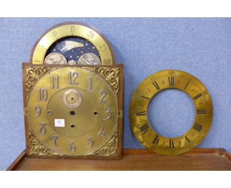 A moon phase rolling longcase clock dial and a chapter ring