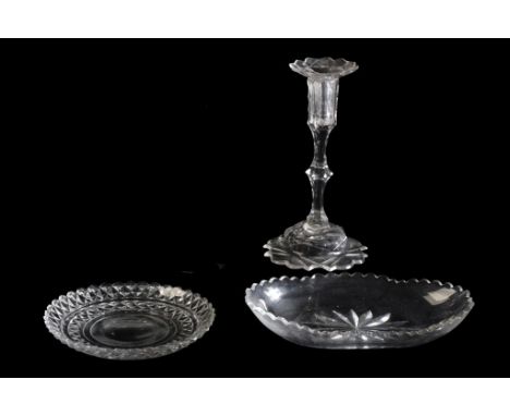 GLASS CANDLESTICK, 18th century, with cut domed base, faceted knop stem, candle holder and sconce, 25cm, an oval glass dish a