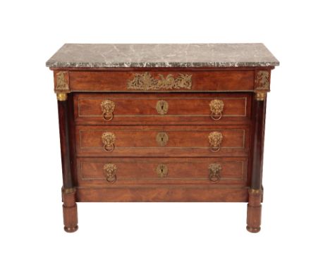 FRENCH EMPIRE ROSEWOOD AND ORMOLU MOUNTED COMMODE, the rectangular mottled grey marble top above an inverted breakfront freiz