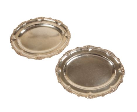 PAIR OF VICTORIAN SILVER MEAT DISHES, by Robert Garrard, London, 1842, shaped oval form, gadrooned border with shell and leaf