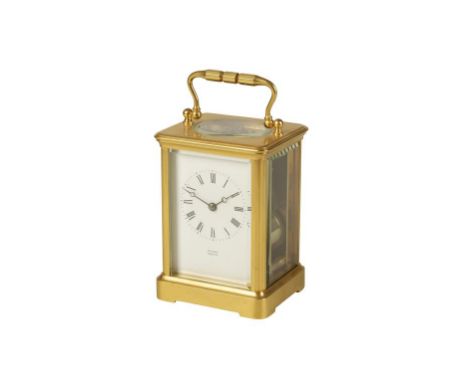 A FRENCH GILT BRASS STRIKING CARRIAGE CLOCK, the white enamel dial with Roman numerals, inscribed " WILSON PENRITH", the move