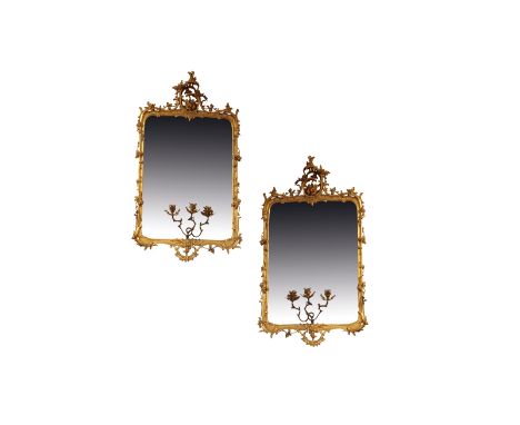 PAIR OF NORTH EUROPEAN GILTWOOD GIRONDOLE MIRRORS, 18th century, each with a rectangular plate in a frame carved with leafy s