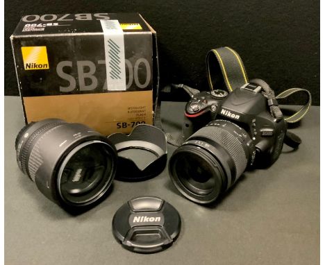 A Nikon D5100 camera, Sigma 18-200mm 1:3.5 lens; a Nikon DX AF-S 18-105mm 1:3.5 lens; Nikon SB-700 Autofocus Speedlight etc. 