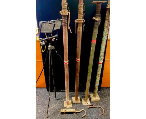 A site tripod floodlight stand; four adjustable steel Acrow props etc. 