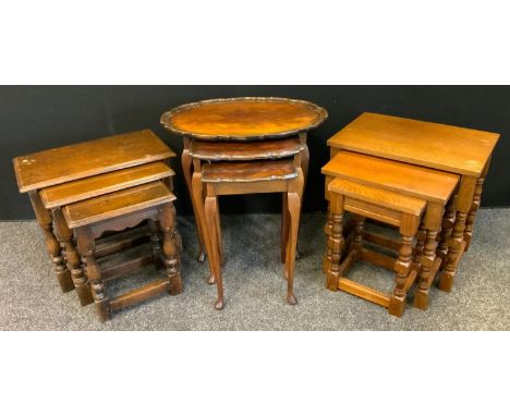 A rustic style nest of three oak occasional tables, turned supports;  another light oak etc (3) 