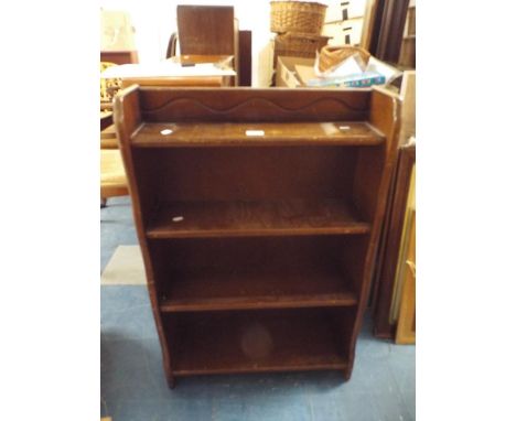 An Edwardian Four Shelf Waterfall Bookcase, 60 cm Wide