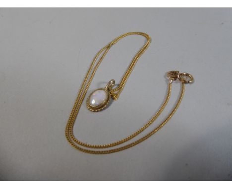 A Gold Necklace with Opal Pendant 