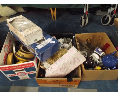 Four Boxes of Sundries to Include Porcelain Head Dolls, Ceramic Bells, Glass Wares and Stone Wares Etc