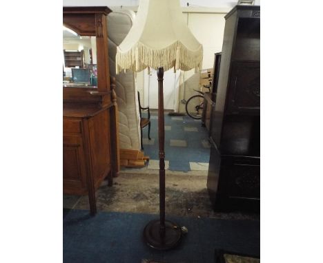 A Turned Mahogany Standard Lamp