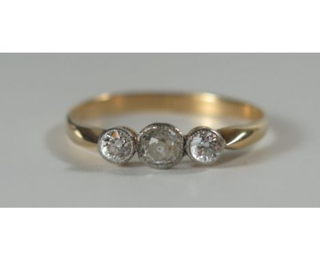 An18ct Gold and Old Cut Diamond Trilogy Ring, millegrain set, central stone c. 3.3mm,m side stones c. 2.9mm, size S, 2.1g 