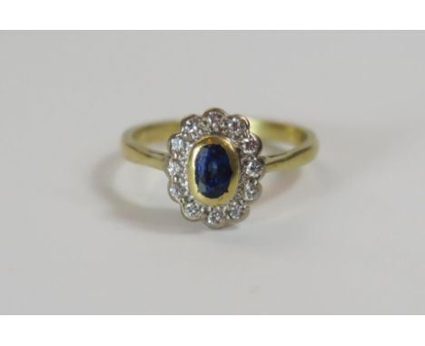 A Pretty 18ct Gold, Sapphire and Diamond Cluster Ring, 11x9mm head, size K, 2.9g 