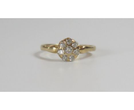 An 18ct Gold and Diamond 'Daisy' Cluster Ring, 7.3mm dead, size I.75, 2g 