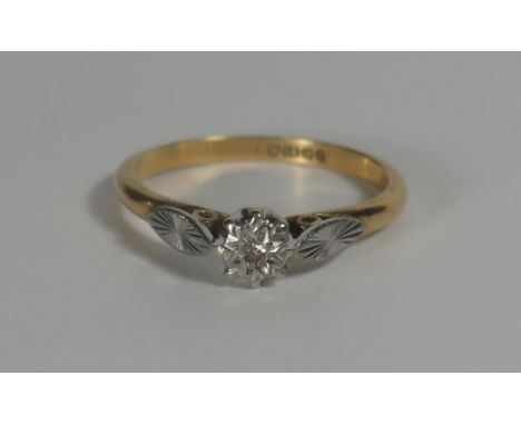 An 18ct Gold and Diamond Solitaire Ring, illusion set, 5.5mm head, size M.5, 2.8g 