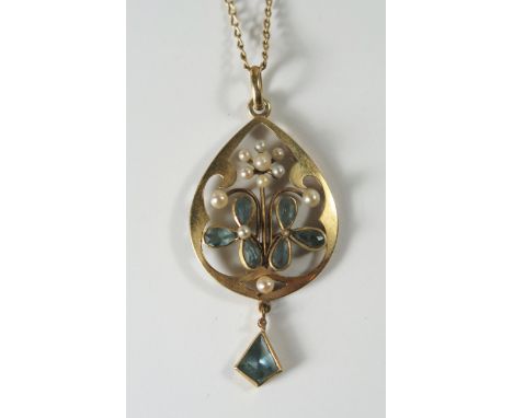 A Pearl and Blue Stone Pendant in an unmarked gold setting, 43mm drop and on a 16" unmarked gold chain, 4.7g 