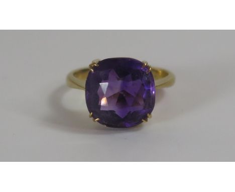 An 18ct Gold and Amethyst Dress Ring, 10.5mm stone, size F, 3.2g 