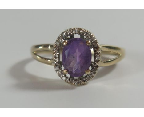 A 9ct Gold, Amethyst and Diamond Ring, size Q, 3g 