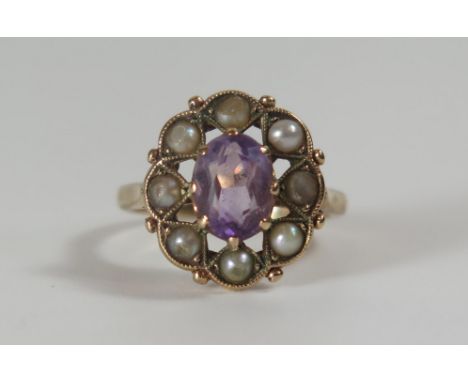 An Amethyst and Pearl Cluster Ring in an unmarked gold millegrain setting, 15x14mm head, size K, 3.3g 