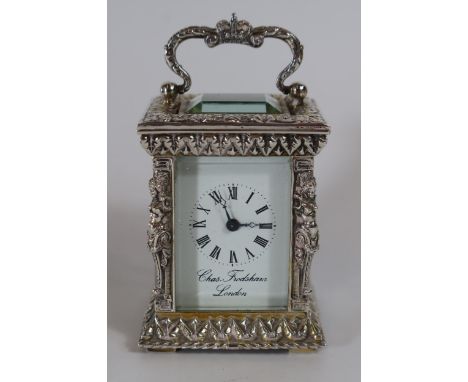 A Charles Frodsham Ornate London Silver and Gilt Cased Miniature Carriage Clock decorated with caryatids, 10.5cm. Running wit