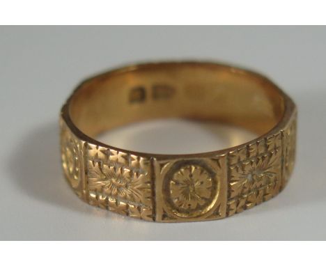 A Victorian 18ct Gold Decahedron Band with chased foliate decoration, 5.5mm diam., Chester 1887, CY BS, size M, 3.5g, 