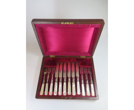 A Canteen of Silver Plated and Mother of Pearl fruit Knives and Forks 