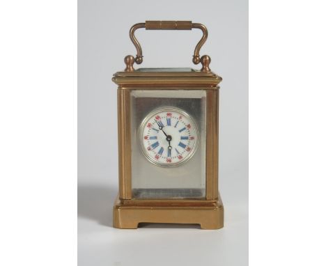 A Gilt Brass Sub Miniature Carriage Clock with enamel dial, 7.5cm high. Running, with key 
