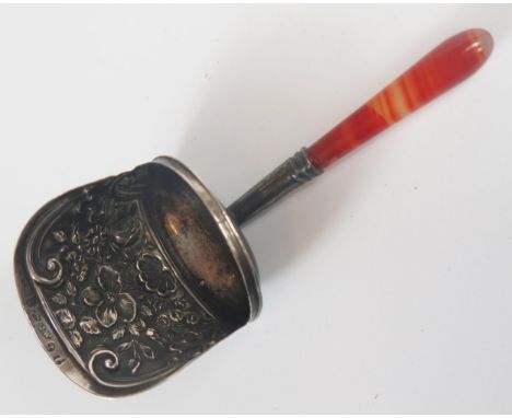 A George III Silver and Agate Handled Tea Caddy Spoon with embossed decoration, Birmingham 1817, Joseph Willmore. Slight spli