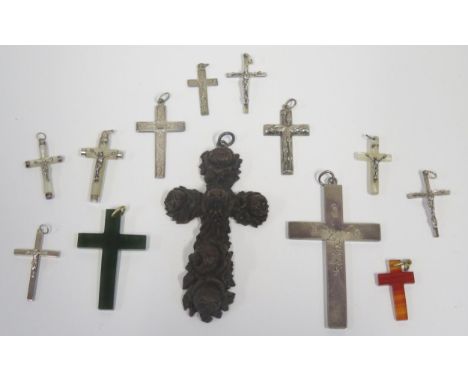 A Selection of Silver and other crosses and crucifix including mother of pearl, treen and nephrite 