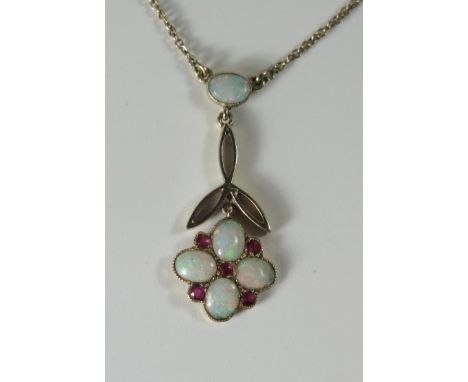 An Opal and Ruby Pendant on an integral 17.5" chain, 30mm drop, chain stamped CT, probably 9ct, 2.8g 