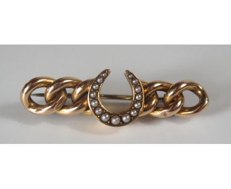 An Unmarked Gold and Pearl Lucky Horseshoe Brooch, 47mm, 6.3g 