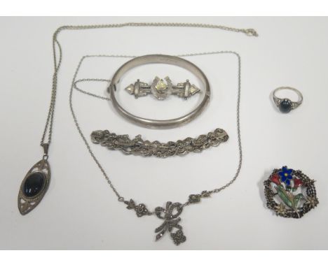 A Hinged Silver Bangle with chased foliate decoration, silver and marcasite necklace and bracelet and other silver jewellery,