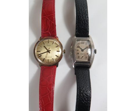 A CYMA Steel Cased Mechanical Wristwatch and TIMEX. Both running 