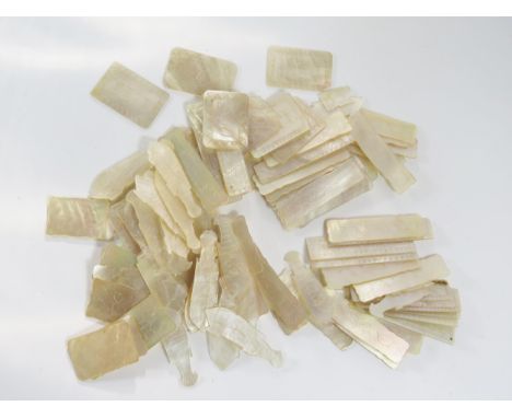 A Collection of 105 Chinese Carved Mother of Pearl Gaming Counters 