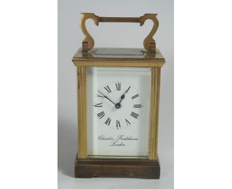 A Charles Frodsham Gilt Brass Carriage Clock, 15cm. Running with key 
