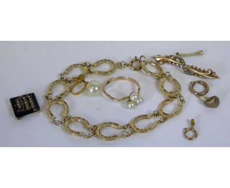 A 9ct Gold Horseshoe Bracelet (10.3g with loose link), a 9ct gold three pearl ring (size Q, 1.9g), 9ct gold brooch and other 