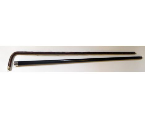 A Heavy Ebony Cane with initialled unmarked silver top (85cm) and Edwardian silver mounted walking stick, London 1901 (c. 85c