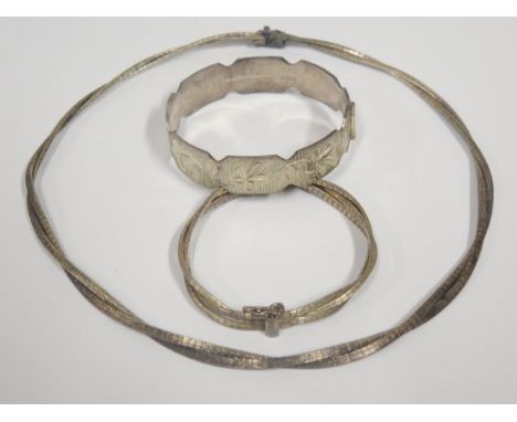A Matching Silver Necklace (18") and bracelet (7.5") and a hinged silver bangle, 83g 