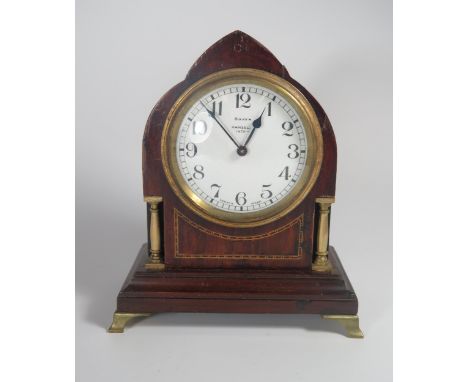 An Edwardian Mahogany and Inlaid Mantle Clock, 18.5cm. Running 