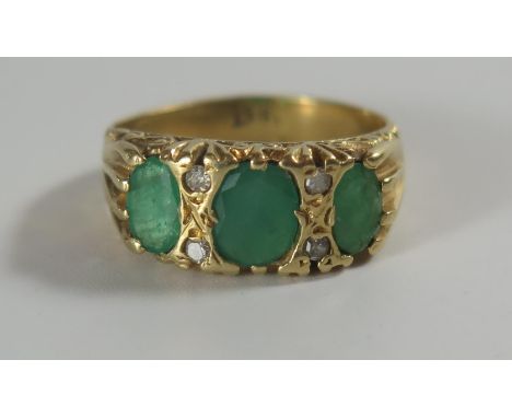 An 18ct Gold, Emerald and Diamond Ring, 16x8mm setting, size J, 4.4g 