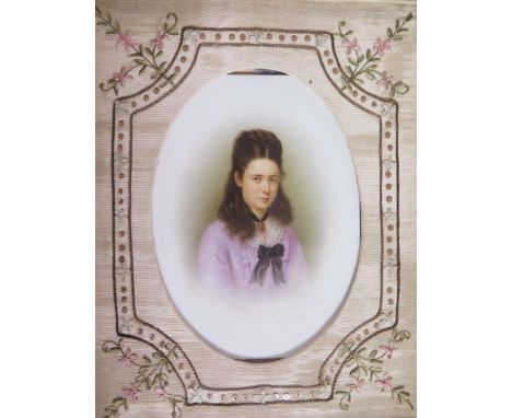 A Victorian half portrait of a young girl on opaline glass with embroidered surround, 30 x 24cm, F &amp; G 