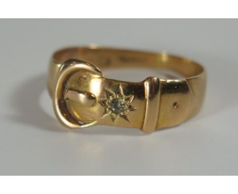 A Victorian 18ct Gold Buckle Ring set with a single diamond, marks rubbed, size U, 4.6g 